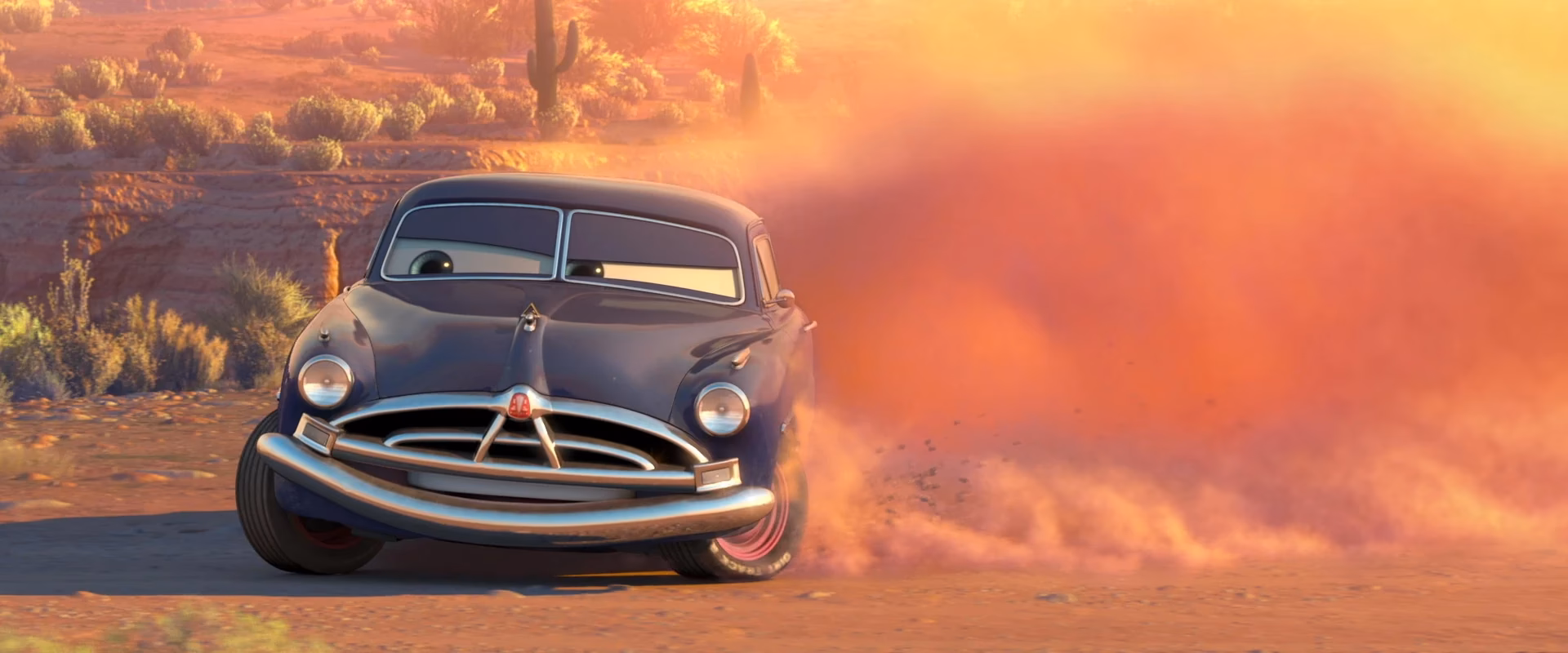 ¿Cómo se llama el entrenador de Rayo McQueen?