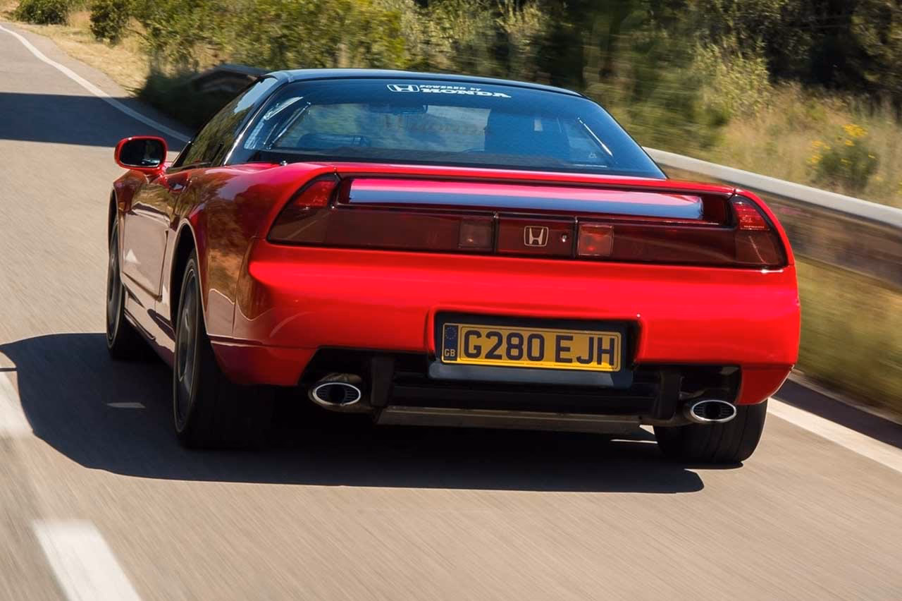 What is the difference between Honda EX and sport?