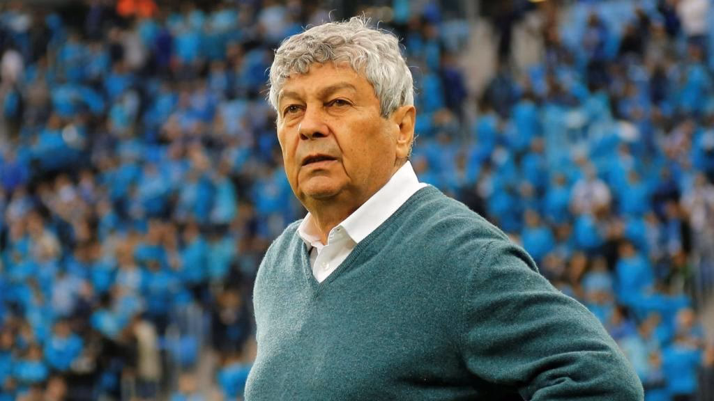 Who is the football manager of Romania?