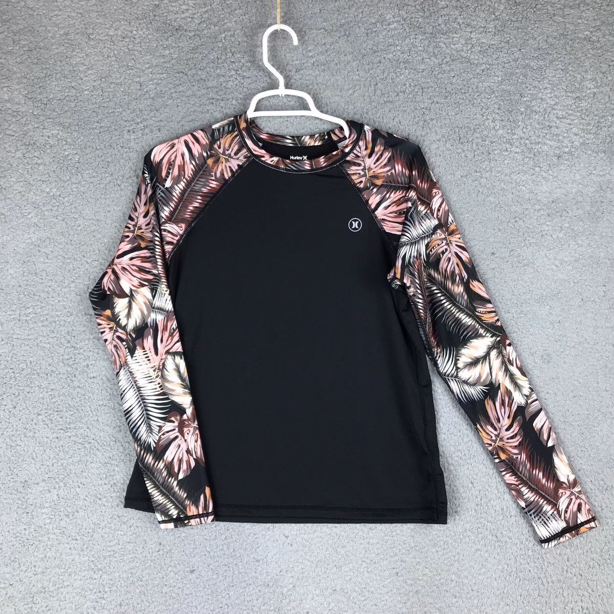 Who is the CEO of Hurley brand?